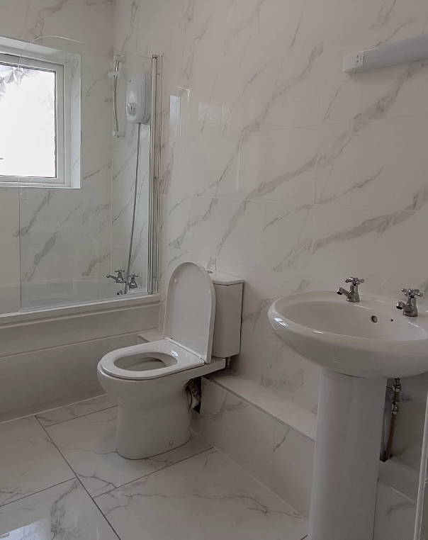 Bathroom renovation with marble tiling